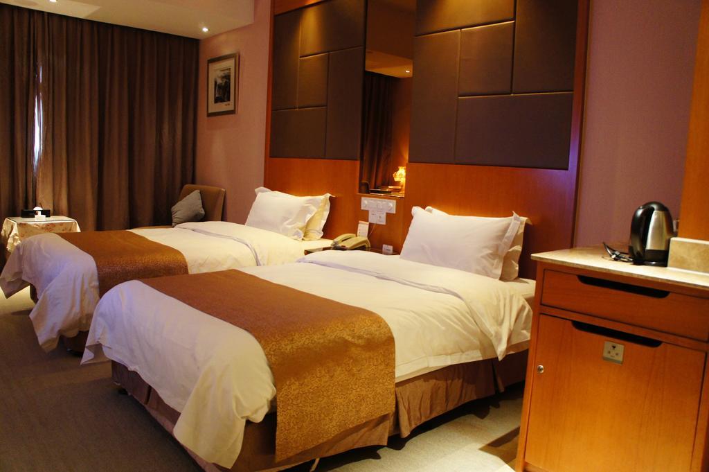 Oriental Hotel Tong Xiang Jiaxing Rum bild