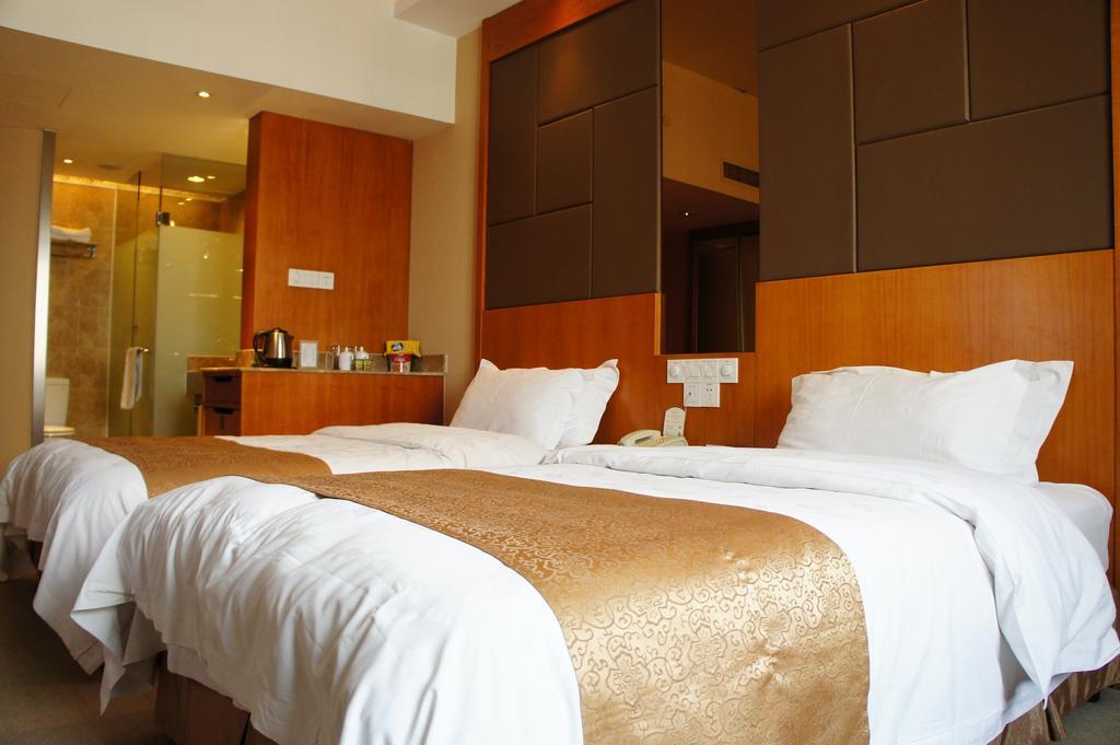 Oriental Hotel Tong Xiang Jiaxing Rum bild