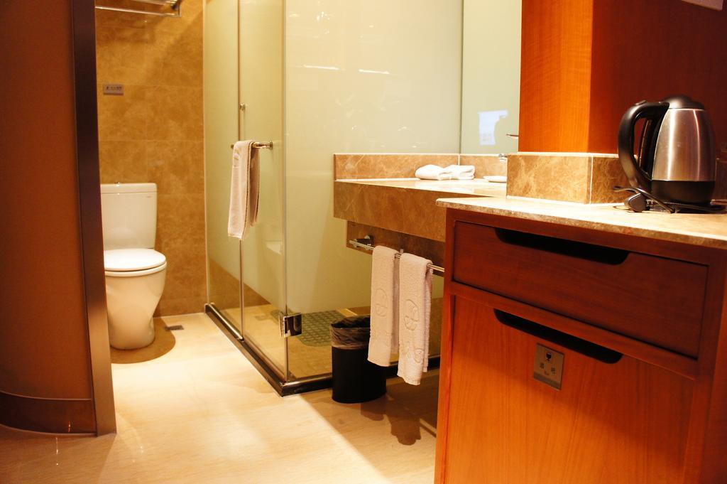 Oriental Hotel Tong Xiang Jiaxing Rum bild